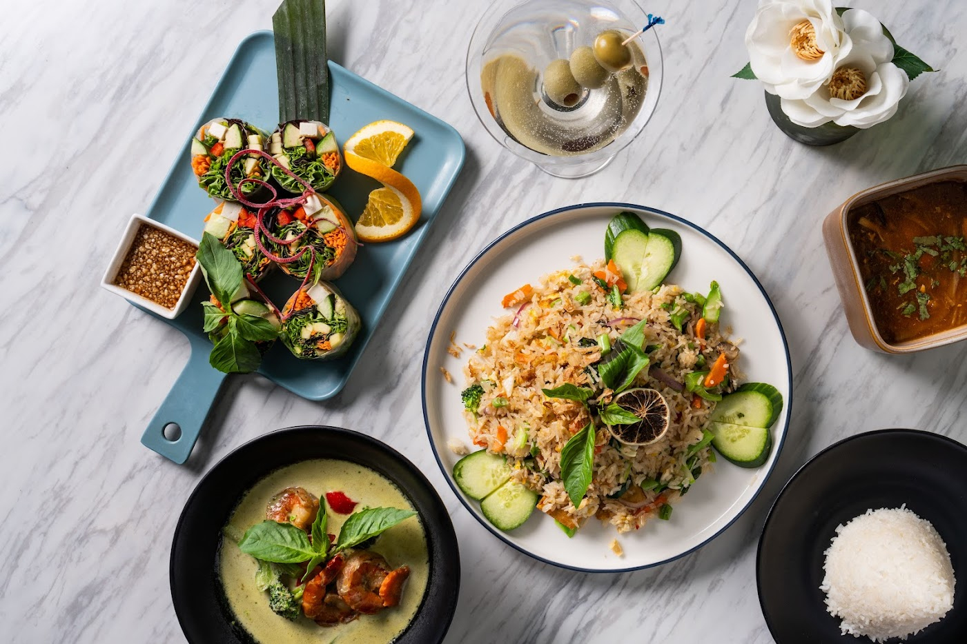 Authentic Thai fried rice with fresh vegetables, shrimp, and fragrant jasmine rice, garnished with lime and cilantro – A classic dish from thairoomgrand.